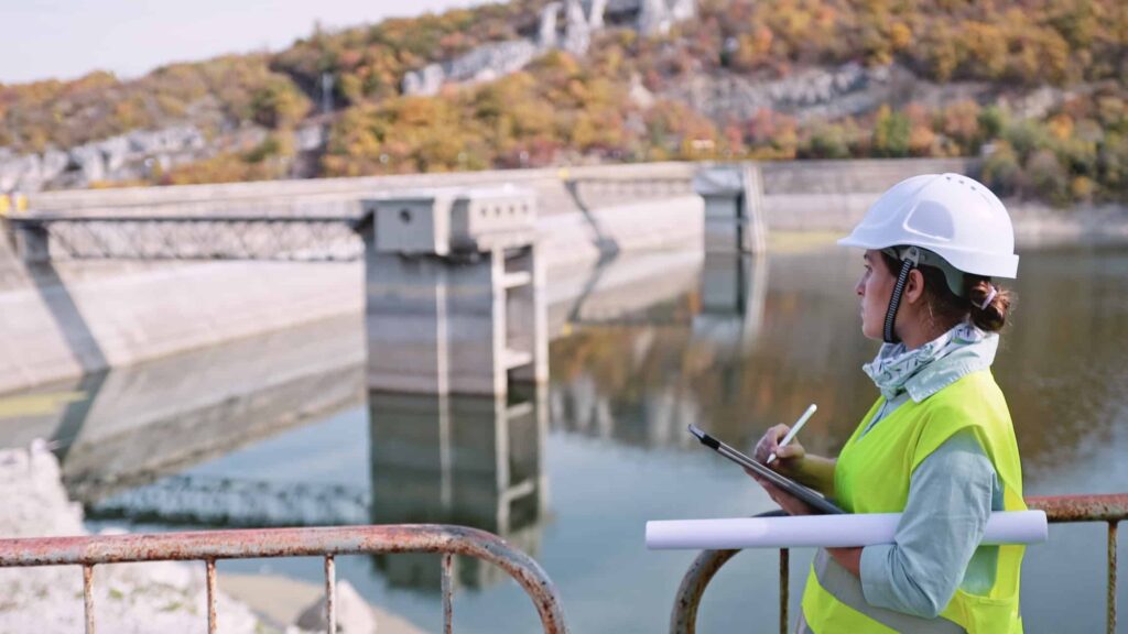 Brazil’s Election Has Investors Watching: This TSX Stock Offers a Different Way In An engineer works at a hydroelectric power station, which creates renewable energy.